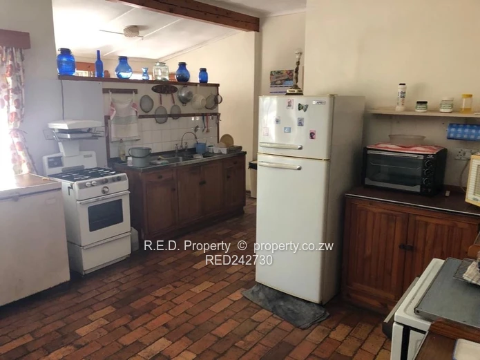 A Brick Under Tile Home In Binga