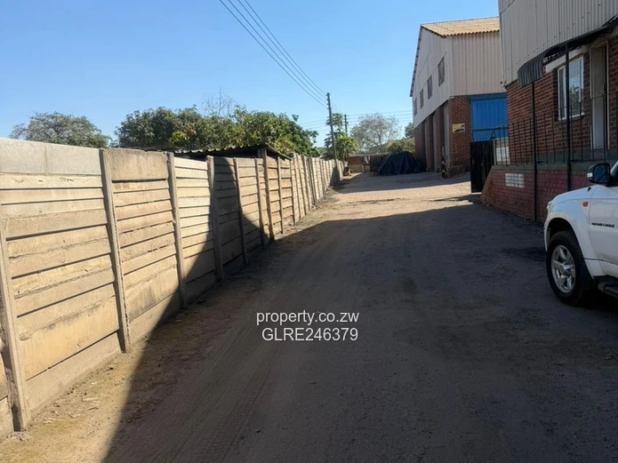 360sqm Ardbennie Warehouse for Rent — Roller Doors & Borehole