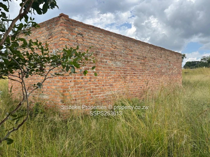 Incomplete brick retail shell on 300m² in  Murehwa