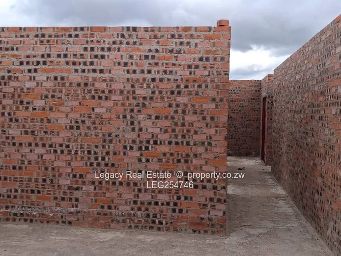 Unfinished 4-Bed Shell in Ruwa - Verandah & Garden