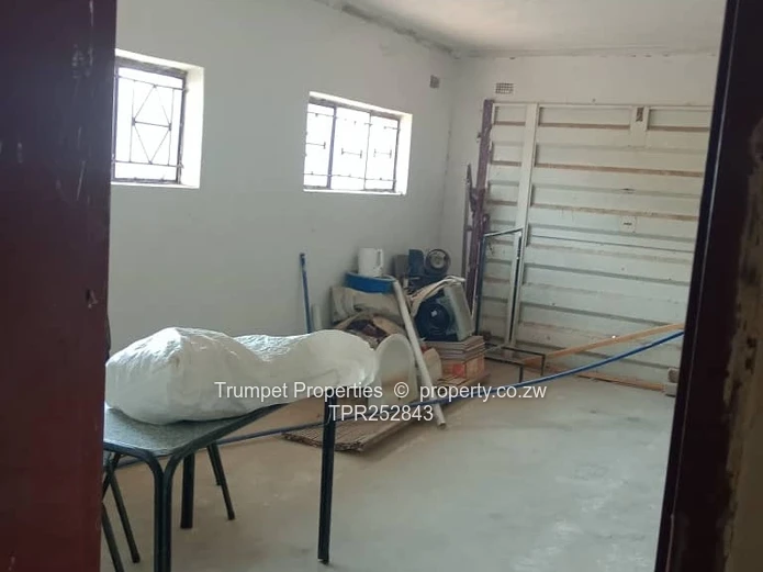 Spacious 4-Bed Brick Home with Verandah & Garage