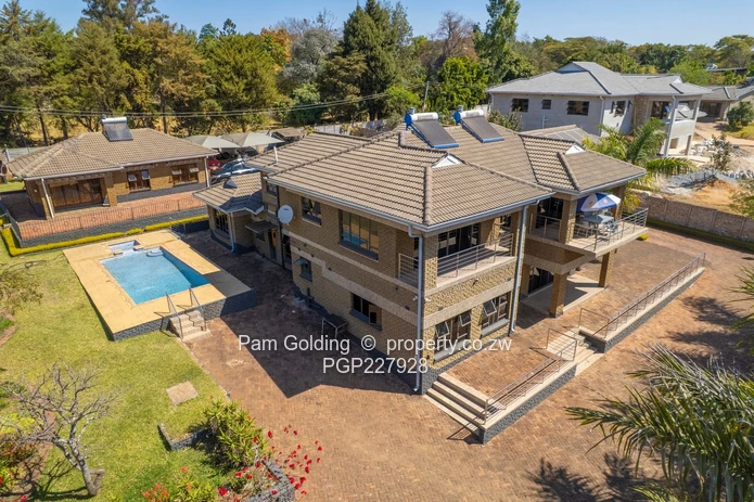 Spacious 6 Bedroom Double Storey Home with a Cottage