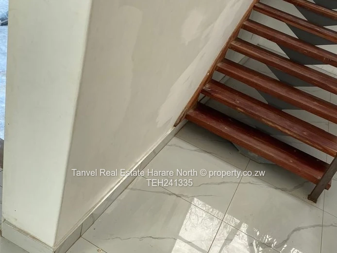 The property is 14 169 square meters in extent. It’s located  100 meters from the blue roof. 