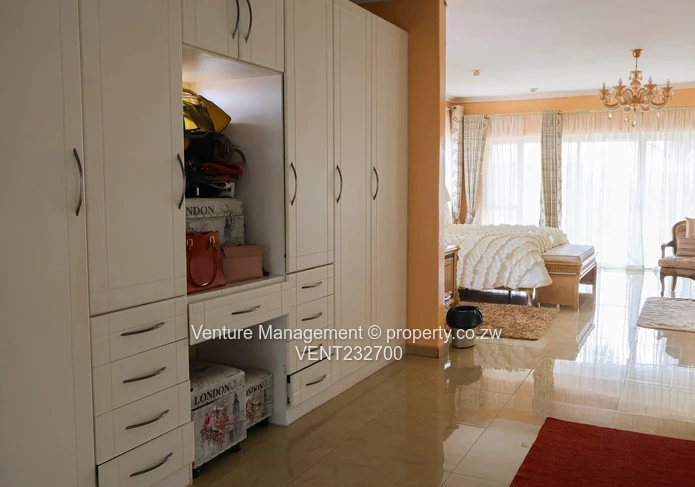 Immaculate 6 Bedroom Mansion with Cottage, Pool & Solar!