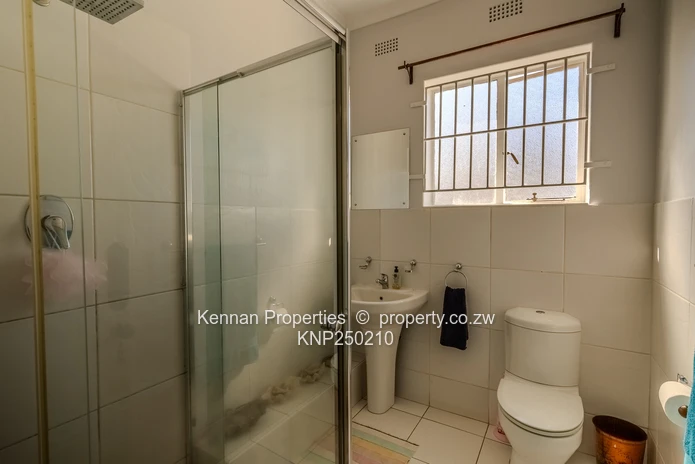 Attractive five bedroom home on two and a half acres. Good water and Msasa trees. (Sole Mandate)