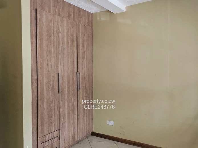 3BR Greendale Flat with Built-in Wardrobes, Borehole & Parking