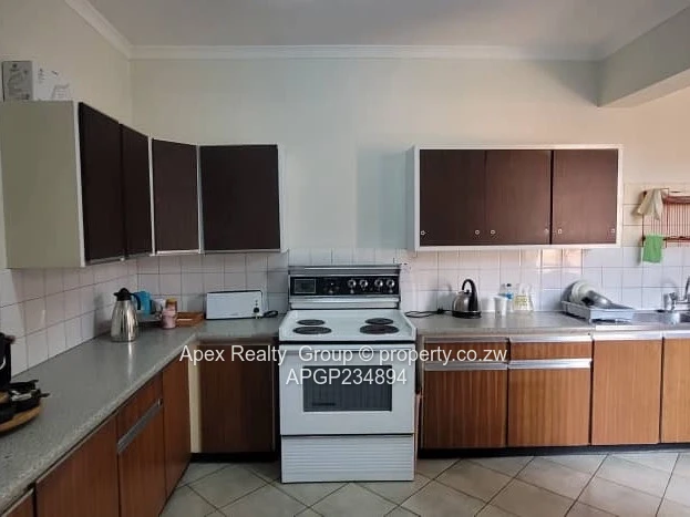 Baines & 3rd Avenue Garden Duplex For Sale