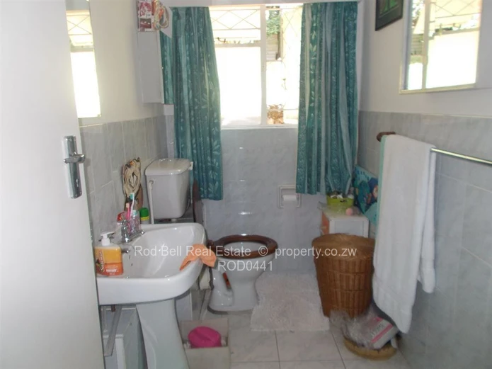 This property offers 2 homes and is set amongst stunning msasa trees