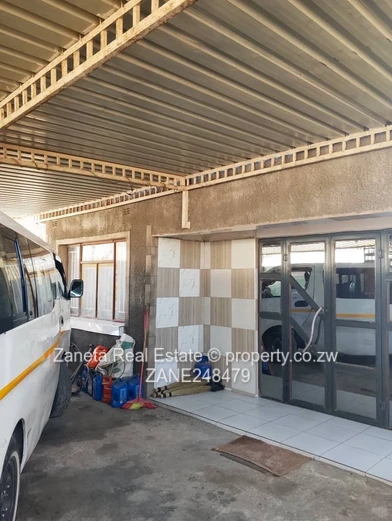 4-Bed, 2-Bath Manyame Park Home — Tiled Hallway & Carport
