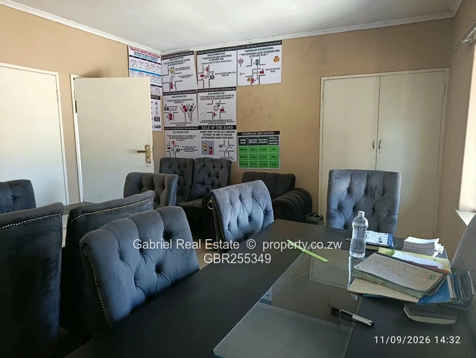 Prime Masvingo CBD Office/flat currently being used as a Driving school, Car wash and restaurant.