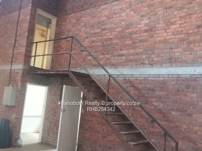 Graniteside Brick Warehouse 700m² on 3500m² — Borehole & Mezzanine