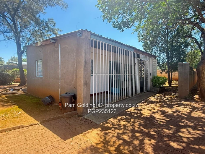Matsheumhlope house with cottages currently used as Nust student accommodation.