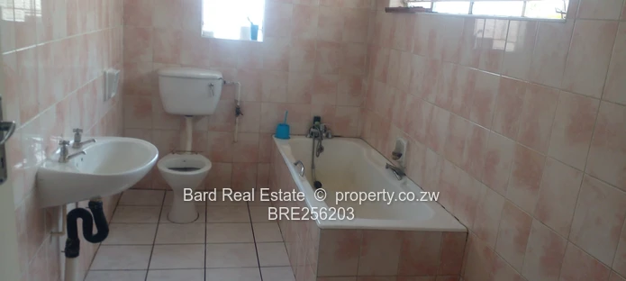 Mainway Meadows: 4-Bed, 3-Bath Home with Fireplace & Garage