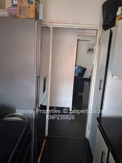 Secure 2-bedroom flat close to Avenues Hospital and Shops.