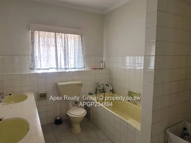 Baines & 3rd Avenue Garden Duplex For Sale