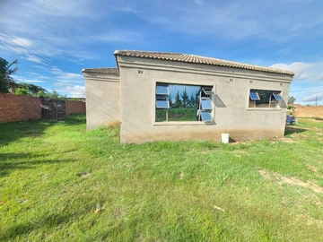 Stand with an incomplete 3 bed cottage