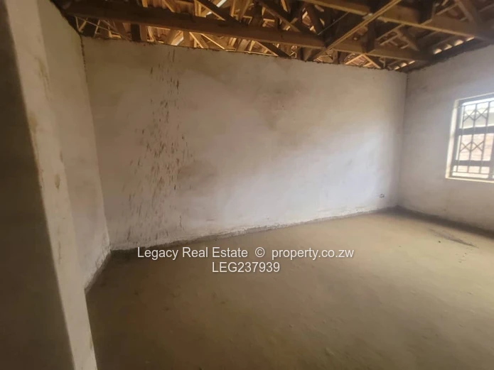 Prime Residential Plot with 4-Bedroom House to Complete