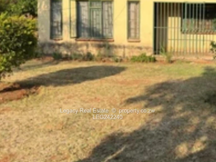 Orange Grove  Land with Incomplete House and a Cottage – Chinhoyi | 9,900m² Stand
