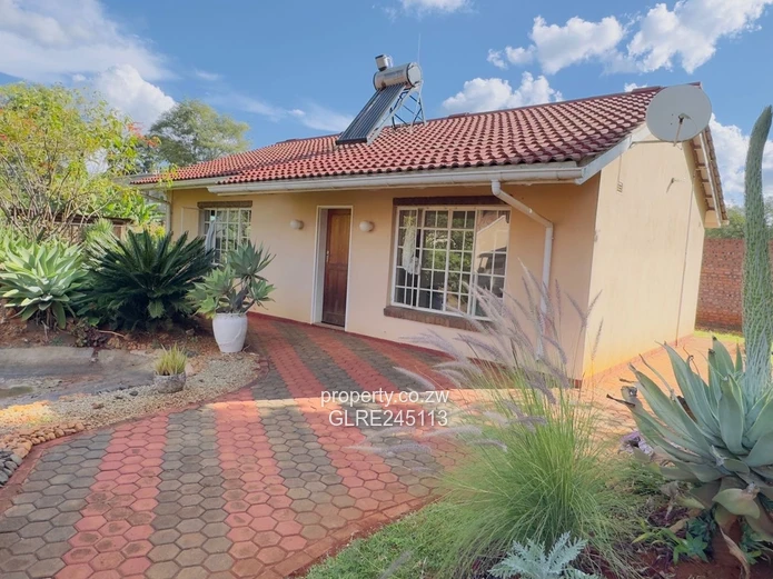 2BR Borrowdale Home — Walled Garden, Paved Drive & Water Tank
