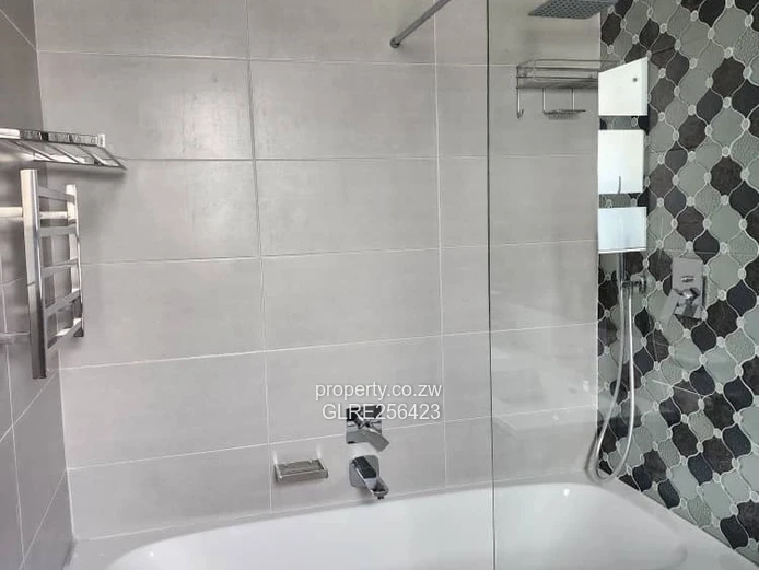 Modern 4BR Greendale Flat — Borehole, Designer Kitchen