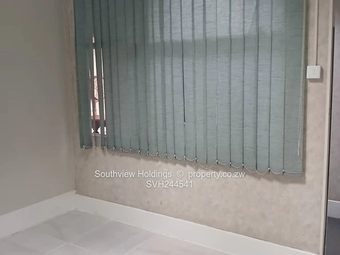 Neat office to let, Upper CBD. Gross rent USD260.00 per month.