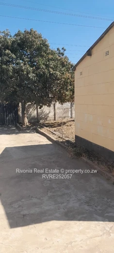 2-Bed Tiled Home with Walled Yard & Access Control