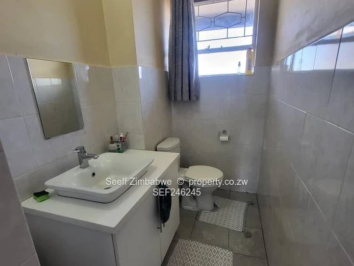 Bright 2-Bed Avenues Apartment with Borehole & Balcony