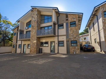 Elegant Duplex Townhouse in a Well-Maintained Complex with Modern Features