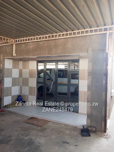4-Bed, 2-Bath Manyame Park Home — Tiled Hallway & Carport