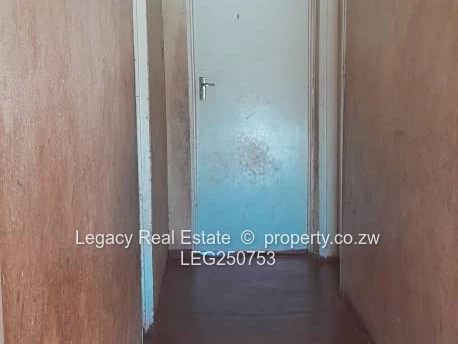 Brick 4-Bed Home with Verandah & Walled Yard