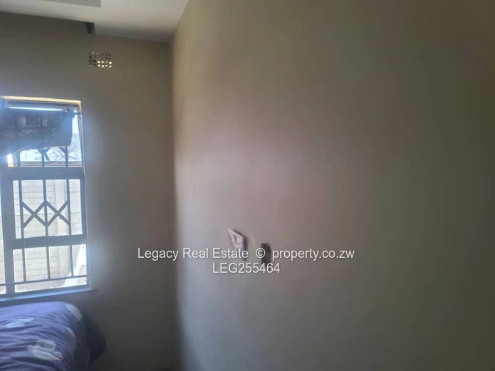Walled 4-Bed Budiriro Home with Iron Gates & Borehole