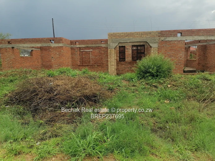 4-Bed Reigate Brick Shell on Main Road