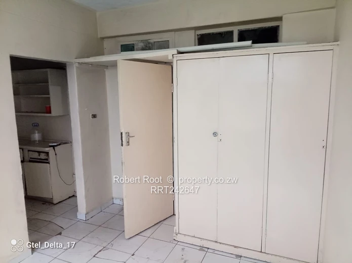 1-Bed Harare CBD Flat — Tiled Floors, Fitted Kitchen