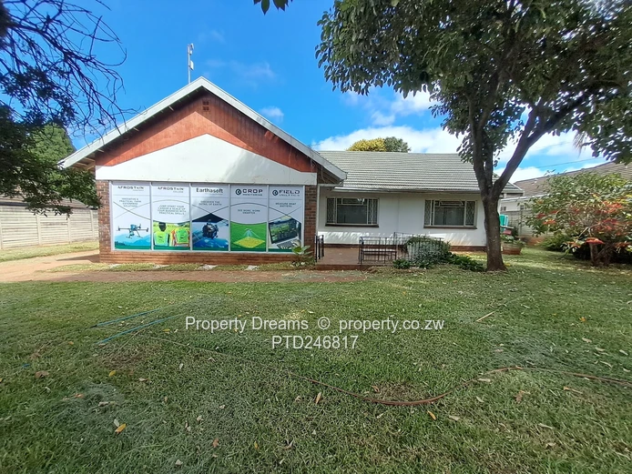 4-Bed Hillside Home on 1,237m² with Borehole & Garage