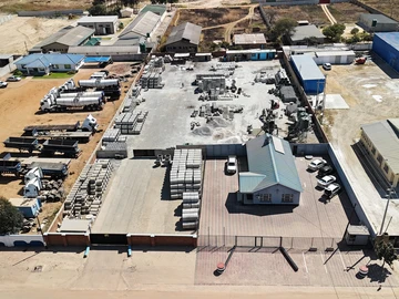 Commercial property sitting on +4000 sqm. Walled, gated, paved and a security booth. An office block