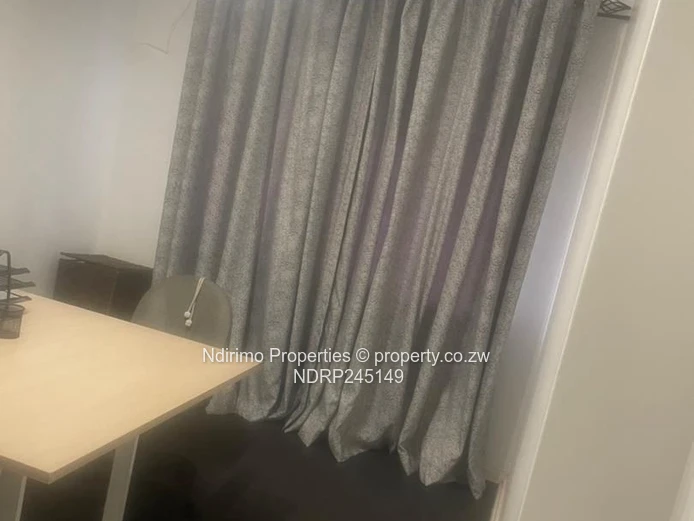 Secure 2-Bed Harare CBD Flat with Balcony, Garden & Modern Kitchen