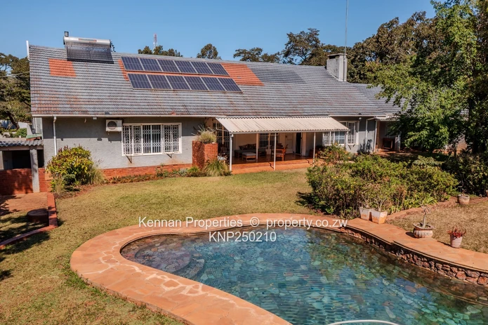 Attractive five bedroom home on two and a half acres. Good water and Msasa trees. (Sole Mandate)