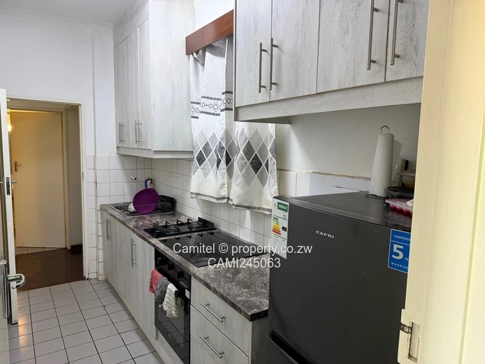 Chinamano Heights:Parquet-Floored 2-Bed Avenues Flat with Borehole (Sole Mandate)