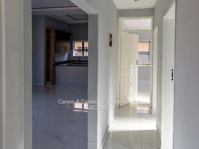 Modern 4-Bed Townhouse in Rainham — Grey & Red Accents, Pool