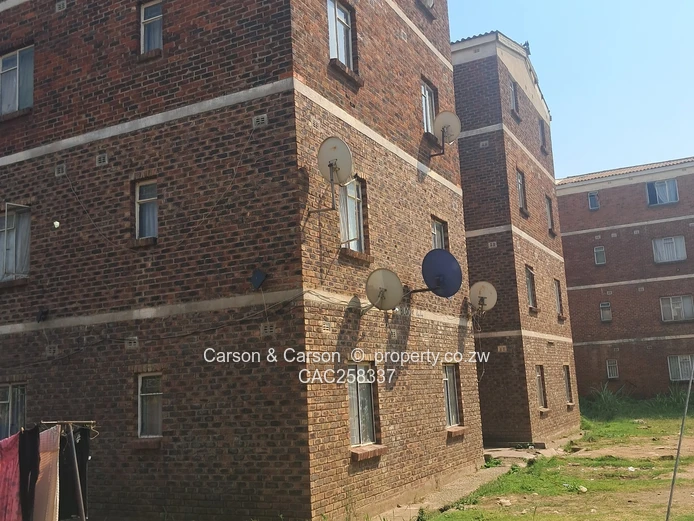 Mufakose 2 bedroom flat lounge fitted kitchen combined toilet and bathroom on ground floor 