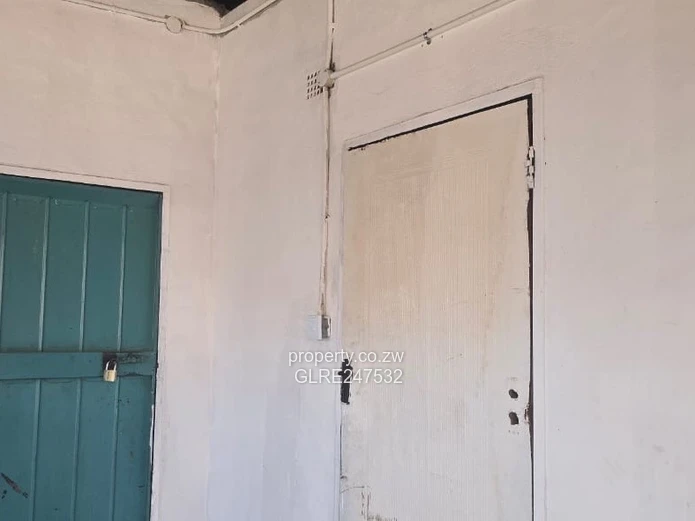 Harare CBD Office: Secure Walled Property with Paved Yard