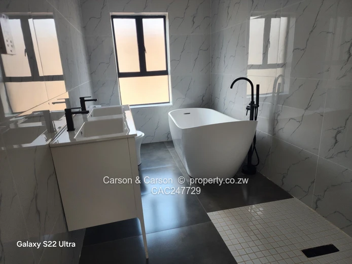 Modern 3-Bed, 2-Bath Garden Flat with Borehole – Borrowdale