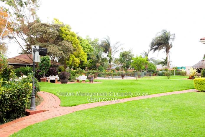 Immaculate 6 Bedroom Mansion with Cottage, Pool & Solar!