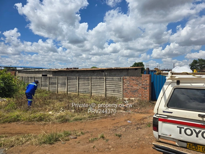 Negotiable Price. Walled & Gated 1,750m² Industrial PLot in Tynwald