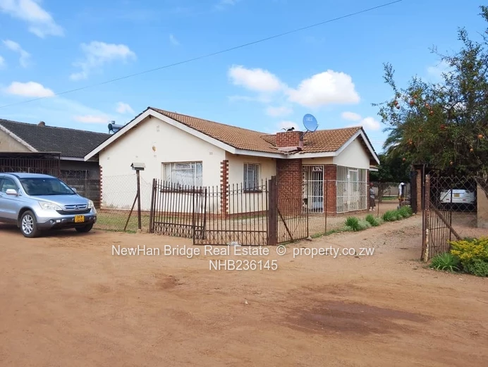 Norton 4-Bed Home with Gated Yard & Mango Trees