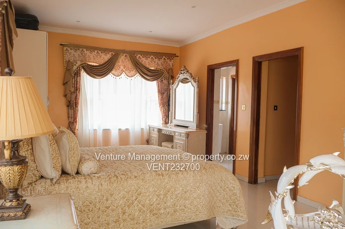 Immaculate 6 Bedroom Mansion with Cottage, Pool & Solar!