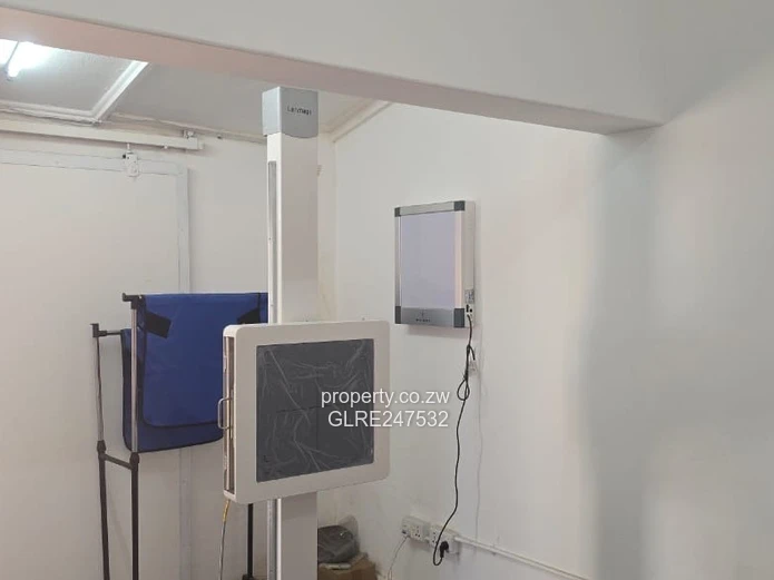 Harare CBD Office: Secure Walled Property with Paved Yard