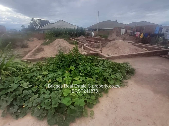 Serviced Residential Stand for Sale with Unfinished Structure