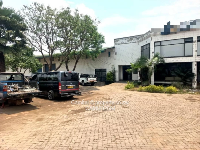  Samon Mazorodze just before Zindoga:Warehouse — Paved Yard, Offices, Borehole (Sole Mandate)