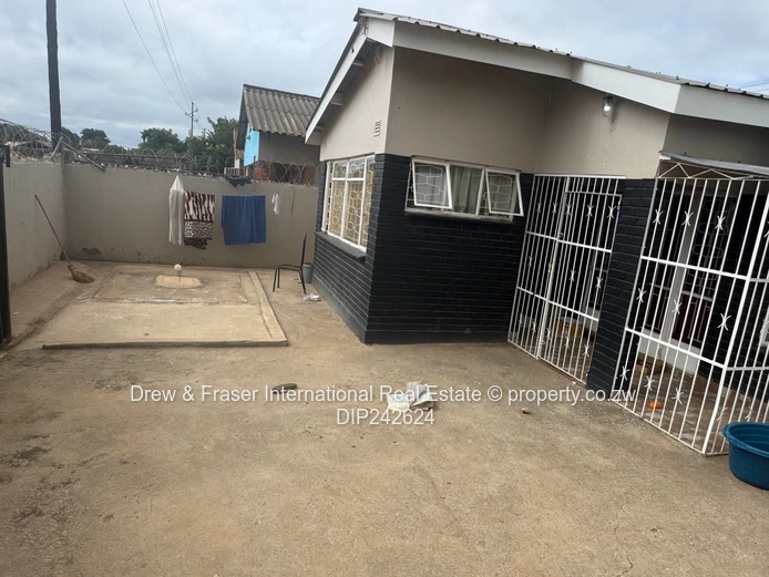 Unit L Seke 3 beds house with a cottage for sale